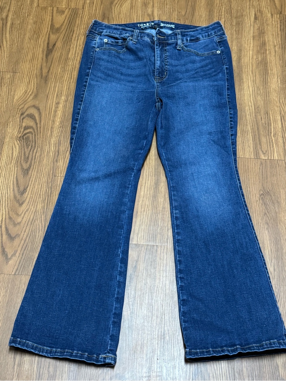 Torrid Trio Fit Slim Bootcut Limitless Stretch Jeans. Stretch to fit size 10-14